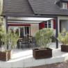 Pergola bioclimatique aluminium anthracite 10,80m² + toit avec lames ovales écru HABRITA