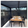 Pergola bioclimatique aluminium anthracite 10,80m² toit avec lames ovales aluminium + 2 rideaux gris pour les côtés – HABRITA
