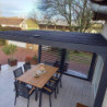 Pergola bioclimatique aluminium anthracite 10,80m² toit avec lames ovales aluminium + ventelles latérales pour côté 3m – HABRITA