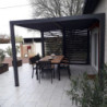 Pergola bioclimatique aluminium anthracite 10,80m² toit avec lames ovales aluminium + ventelles latérales pour côté 3m – HABRITA