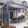 Pergola bioclimatique aluminium anthracite 10,80m² toit avec lames ovales aluminium + ventelles latérales pour côté 3m – HABRITA