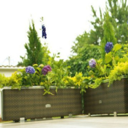 Bac à plantes 108x39x43cm en résine tressée marron foncé nuancé et acier galvanisé Rattan Art