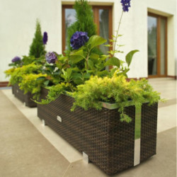 Bac à plantes 108x39x43cm en résine tressée marron foncé nuancé et acier galvanisé Rattan Art